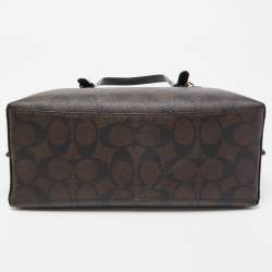 Pre Owned Coach Brown/Black Signature Coated Canvas Tatum Caryall Tote