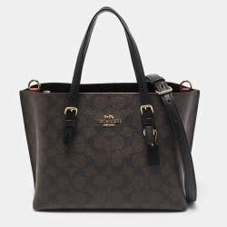 Pre Owned Coach Brown/Black Signature Coated Canvas Tatum Caryall Tote