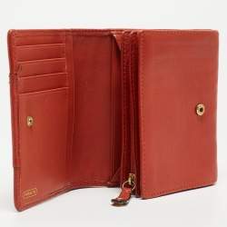 Pre Owned Coach Orange Leather Ashley Compact Wallet