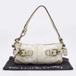 Pre Owned Coach Pale Gold/Beige Signature Canvas and Leather Baguette 