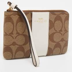 Pre Owned Coach Beige Signature Canvas and Leather Corner Zip Wristlet
