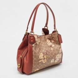 Pre Owned Coach Beige/Brown Signature Prairie Floral Canvas and Leather Edie 31 Satchel