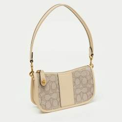 Pre Owned Coach Beige/Cream Signature Canvas and Leather Swinger Pochette Bag