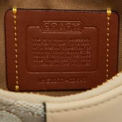 Pre Owned Coach Beige/Cream Signature Canvas and Leather Swinger Pochette Bag