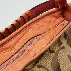 Pre Owned Coach Beige/Orange Signature Canvas and Patent Leather Katarina Hobo