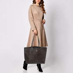 Pre Owned Coach Brown/Black Signature Coated Canvas Reversible City Tote