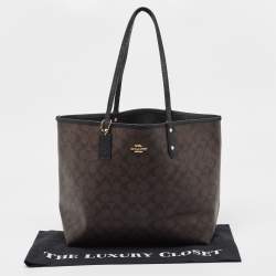 Pre Owned Coach Brown/Black Signature Coated Canvas Reversible City Tote