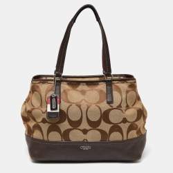 Pre Owned Coach Brown/Beige Signature Canvas and Leather Hamptons Weekend Tote