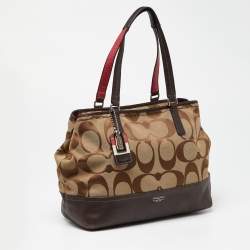 Pre Owned Coach Brown/Beige Signature Canvas and Leather Hamptons Weekend Tote