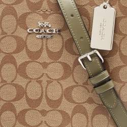 Pre Owned Coach Beige/Green Signature Coated Canvas and Leather Town Bucket Bag