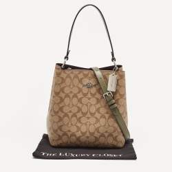Pre Owned Coach Beige/Green Signature Coated Canvas and Leather Town Bucket Bag