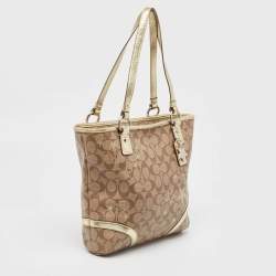Pre Owned Coach Beige/Gold Signature Coated Canvas and Leather Heritage Star Tote