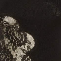 مملوكة مسبقًا بلوڤر دي أند جي صوف عنق سلحفاة حا شية دانتيل شفاف أسود مقاس وسط (ميديم)