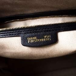 Pre Owned Diane von Furstenberg White/Black Leather Wristlet Clutch