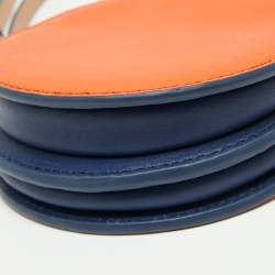 Pre Owned Diane von Furstenberg Orange/Blue Leather Round Clutch