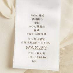 مملوكة مسبقًا تنورة ديور ميدي تول بنمط طيات غير بيضاء مقاس صغير (سمول)