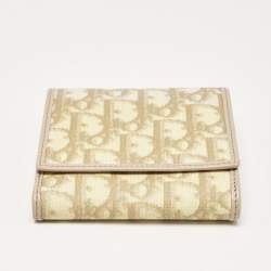 Pre Owned Dior Beige Oblique Coated Canvas and Leather French Flap Wallet