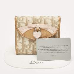 Pre Owned Dior Beige Oblique Coated Canvas and Leather Romantique Compact Wallet
