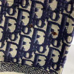 Pre Owned حقيبة يد ديور كتاب كبيرة كانفاس مطرزة بلون أزرق كحلي مع تصميم مائل