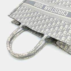 مملوكة مسبقًا حقيبة ديور توت كتاب نسيج رمادي أبيض مائل