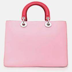 مملوكة مسبقًا حقيبة يد توت ديوريسيمو جلد زهري من كريستيان ديور مع حزام وحقيبة صغيرة