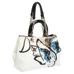 Pre Owned حقيبة يد ديور دي لايت غرافيتي كانفاس وجلد لامع د إصدار محدود بيج/أسود