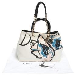 Pre Owned حقيبة يد ديور دي لايت غرافيتي كانفاس وجلد لامع د إصدار محدود بيج/أسود