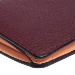 Pre Owned Dior Plum Leather Voyager Bifold Continental Wallet