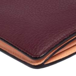 Pre Owned Dior Plum Leather Voyager Bifold Continental Wallet