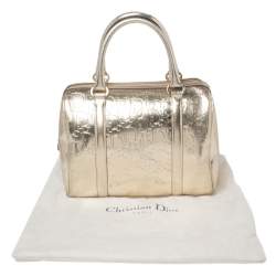 Pre Owned حقيبة بوسطن كريستيان ديور جلد أوبليك ذهبي ميتاليك منقوش