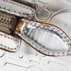 Pre Owned حقيبة بوسطن كريستيان ديور جلد أوبليك ذهبي ميتاليك منقوش