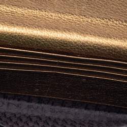 Pre Owned Dior Metallic Gold Grained Leather CD Logo Wristlet Clutch