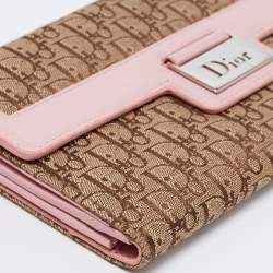 Pre Owned محفظة ديور كونتيننتال جلد وكانفاس مائل بيج / وردي بقلاب