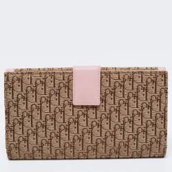 Pre Owned محفظة ديور كونتيننتال جلد وكانفاس مائل بيج / وردي بقلاب