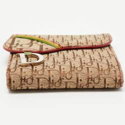 Pre Owned Dior Beige Oblique Canvas Rasta Saddle Compact Wallet