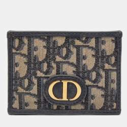 Saddle lotus wallet best sale blue dior oblique jacquard