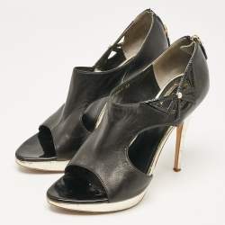 Pre Owned Dior Black/Gold Leather Bow Cut Out Platform Pumps Size 38