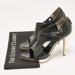 Pre Owned Dior Black/Gold Leather Bow Cut Out Platform Pumps Size 38