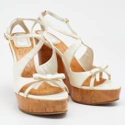 مملوكة مسبقًا صندل ديور جلد أوف وايت لامع كعب روكي فينيل نعل سميك مقاس 39.5