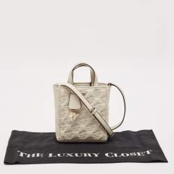 Pre Owned Dkny White Signature Embossed Leather Mini Lexi Tote
