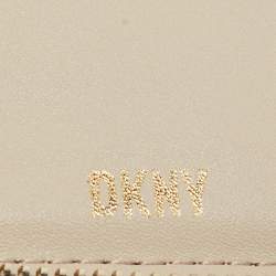Pre Owned DKNY Beige/Brown Signature Coated Canvas and Leather Vela Zip Around Wallet