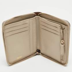 Pre Owned DKNY Beige/Brown Signature Coated Canvas and Leather Vela Zip Around Wallet