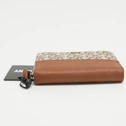 Pre Owned DKNY Beige/Brown Signature Coated Canvas and Leather Vela Zip Around Wallet