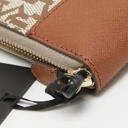 Pre Owned DKNY Beige/Brown Signature Coated Canvas and Leather Vela Zip Around Wallet