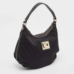Pre Owned Dkny Black Monogram Canvas and Leather Zip Hobo