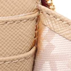 Pre Owned DKNY Beige/Red Canvas and Leather Zip Around Wallet