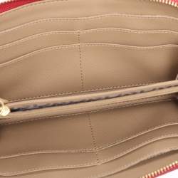 Pre Owned DKNY Beige/Red Canvas and Leather Zip Around Wallet