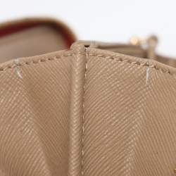 Pre Owned DKNY Beige/Red Canvas and Leather Zip Around Wallet