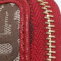 Pre Owned DKNY Beige/Red Canvas and Leather Zip Around Wallet