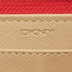 Pre Owned محفظة كونتيننتال دي كاي إن واي قماش بيج/أحمر بنمط مونوغرام بسحاب